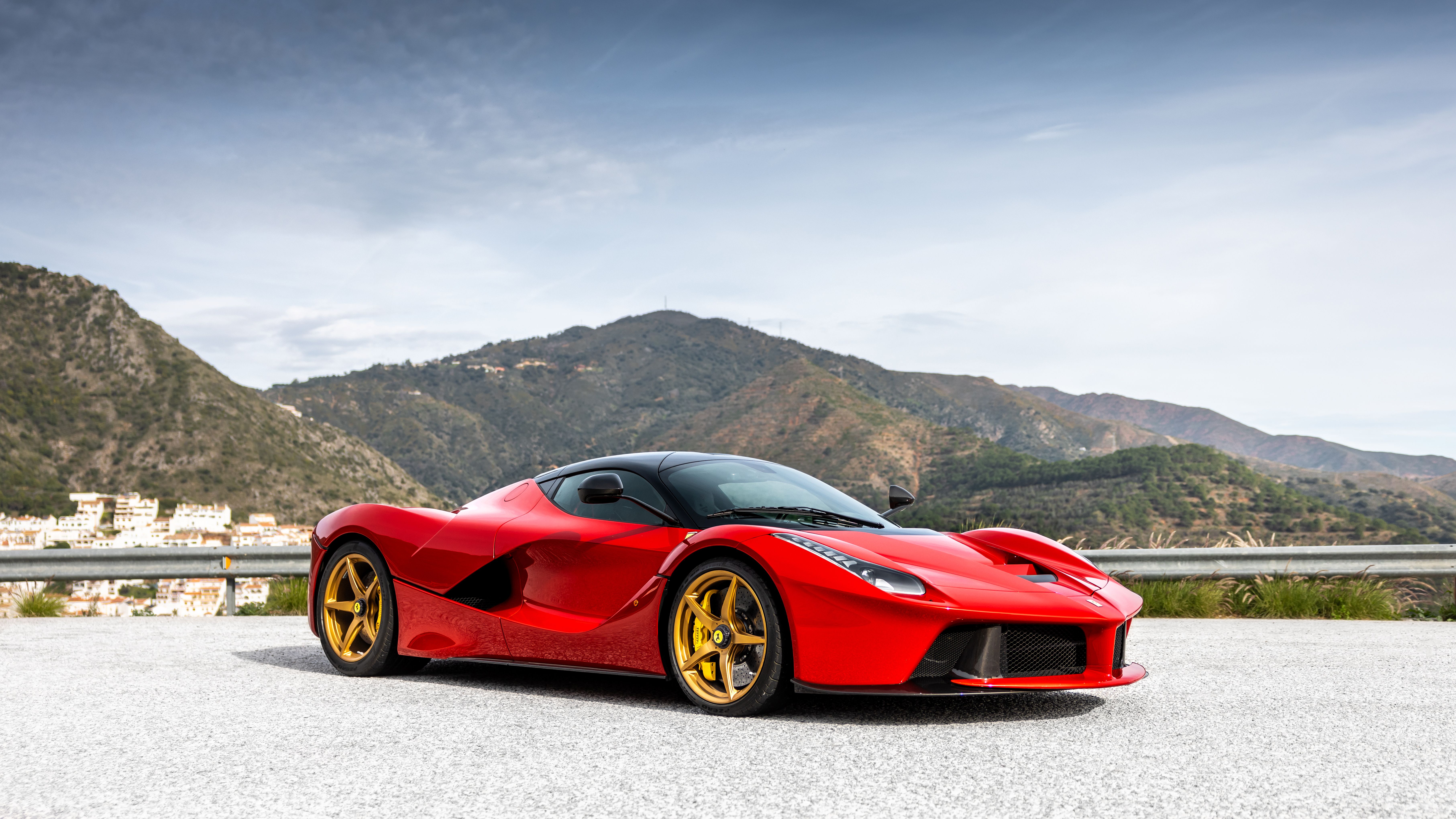 Red Ferrari LaFerrari front three-quarter, close side view